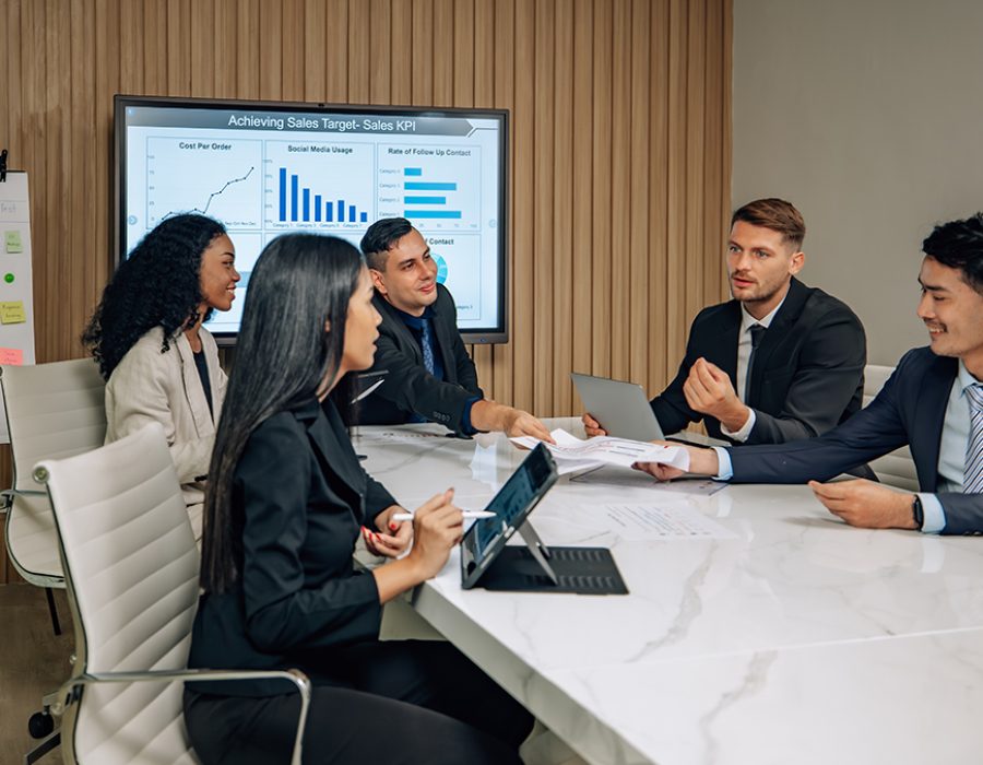 Diverse team innovates for sales KPIs via collaborative brainsto The multicultural business team engages in collaborative brainstorming sessions to develop cutting-edge strategies and new business model for achieving our sales key performance indicators (KPIs).