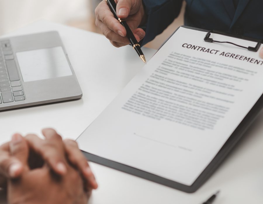Real estate agents explain models of housing estates in projects Real estate agents explain models of housing estates in projects to elaborate to clients, explaining and presenting information about homes and purchasing loans. Real estate trading concept.